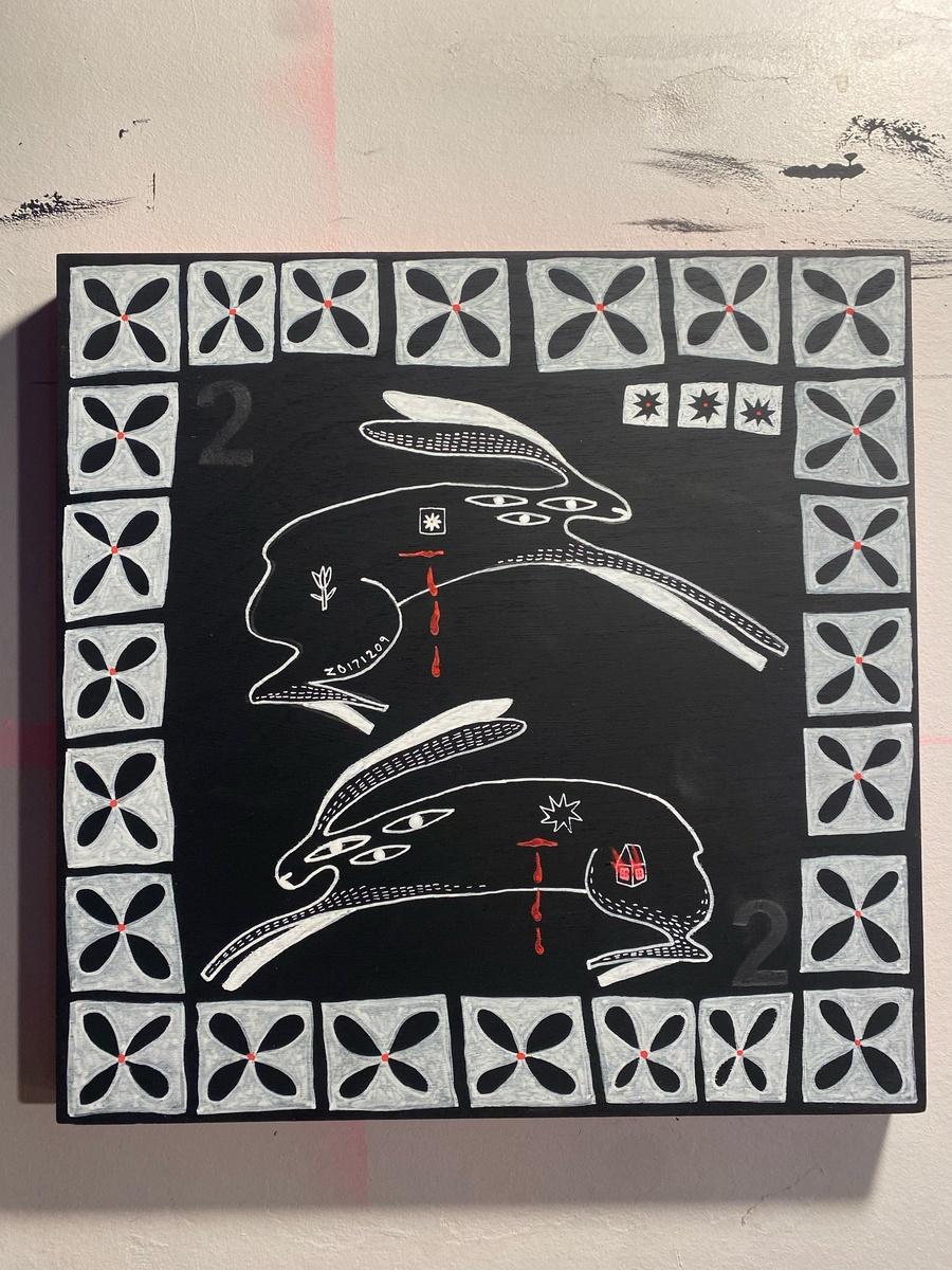 2 wounded rabbits